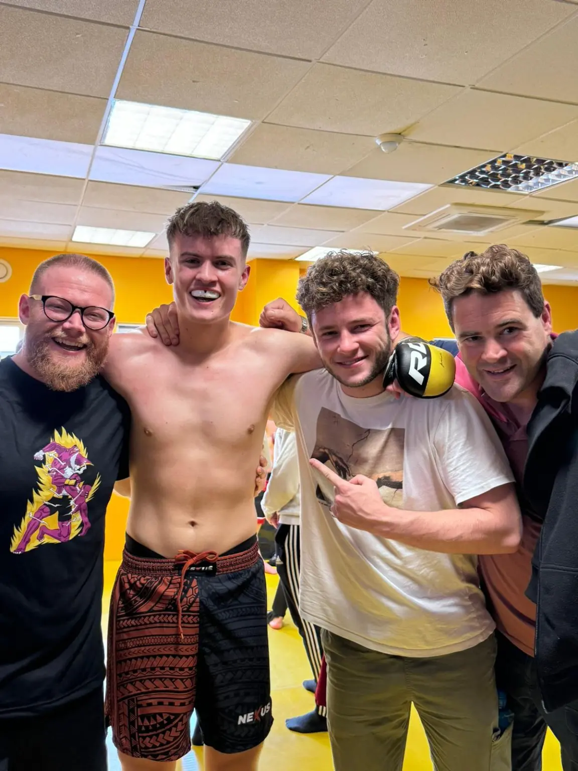 Strange Wolves members celebrating after a bout