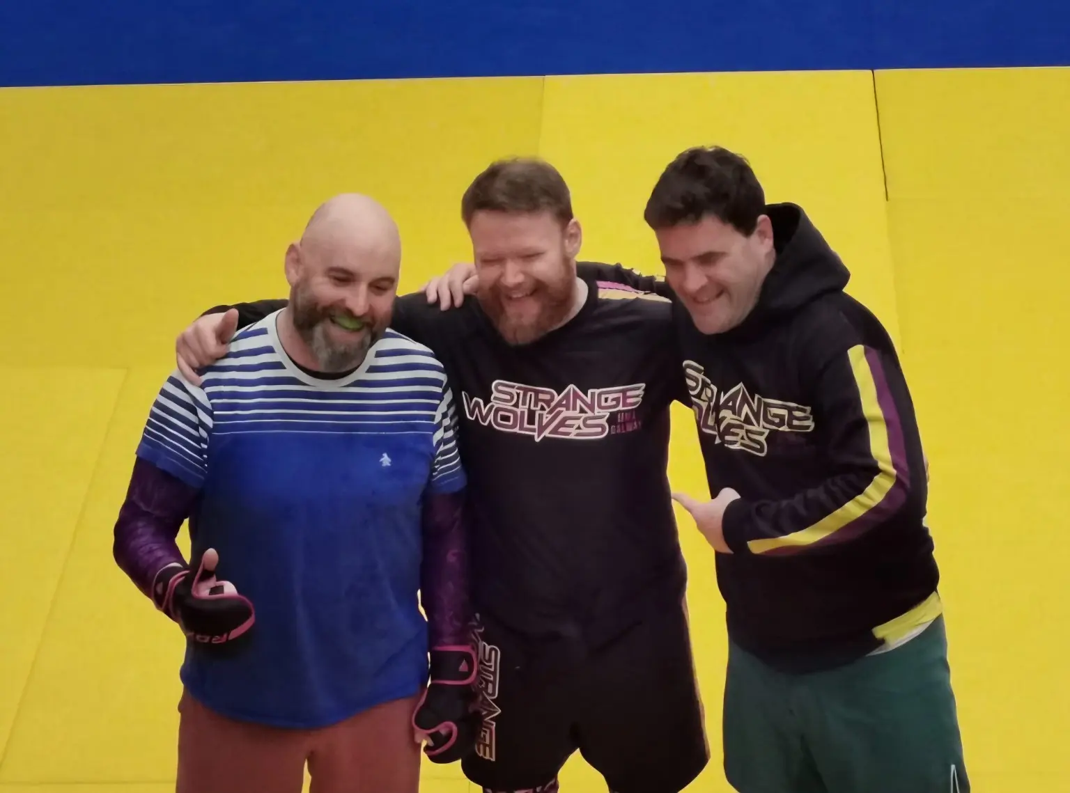 Three Strange Wolves members together after training
